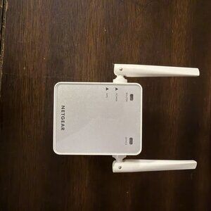 NETGEAR EX2700 300 Mbps WiFi Range Extender - Wall-plug, External Antenna